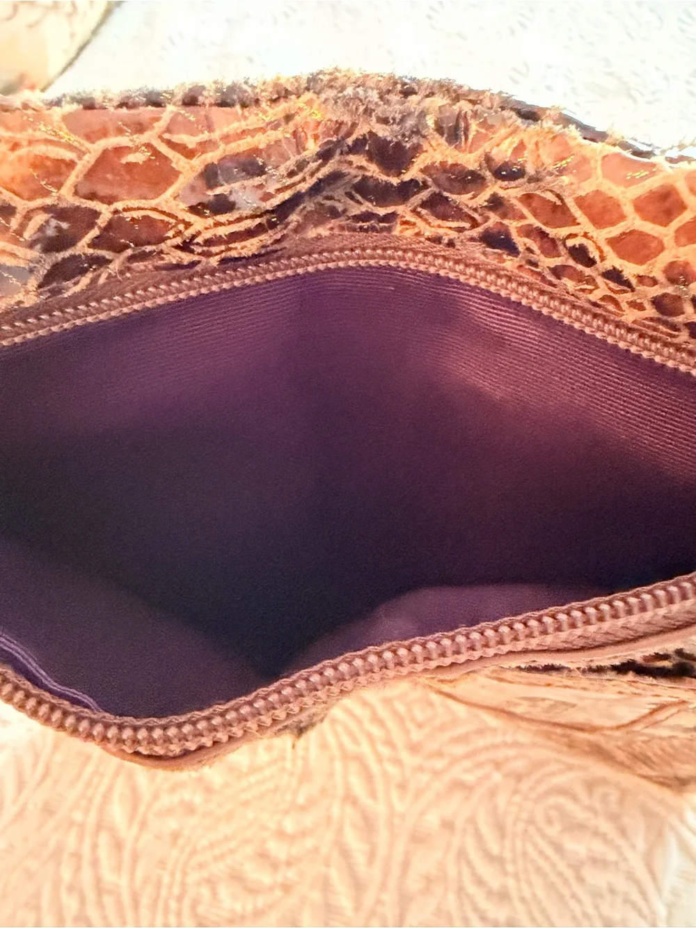 HOBO Animal-Print Snake-Embossed Frame Clutch in Black and Brown